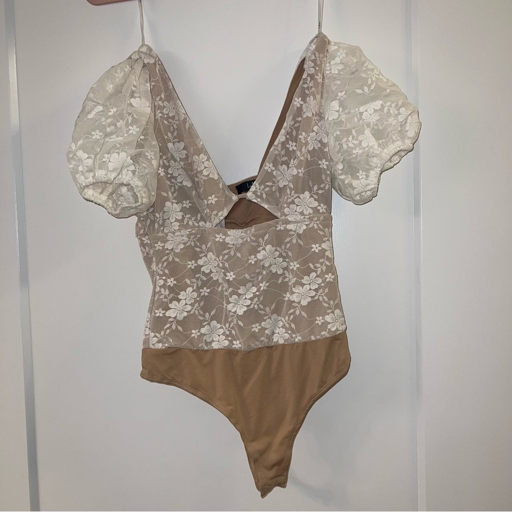 So Sunny Ivory Lace Cutout Short Sleeve
Bodysuit - Picture 9 of 12